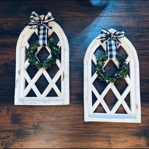 Two church windows with wreaths
